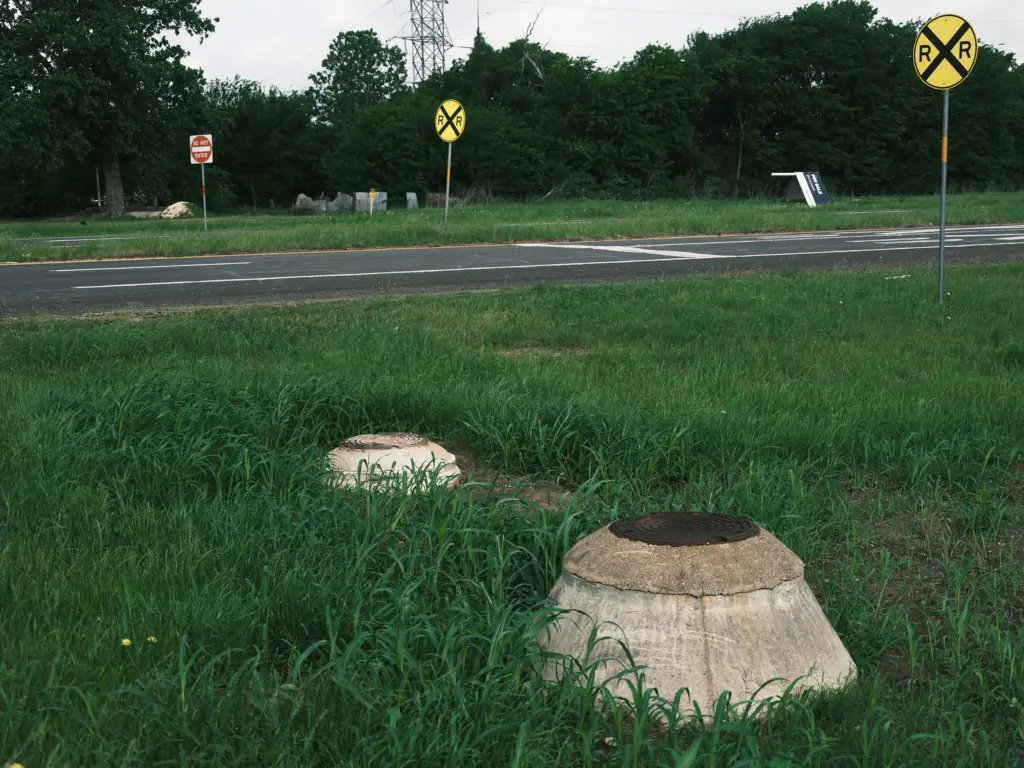 Cars often crash into raised manhole covers along Route 77 in Lacy Lakeview. The city would replace or relocate the manholes with additional tax revenue from the proposed Infrakey data center.
