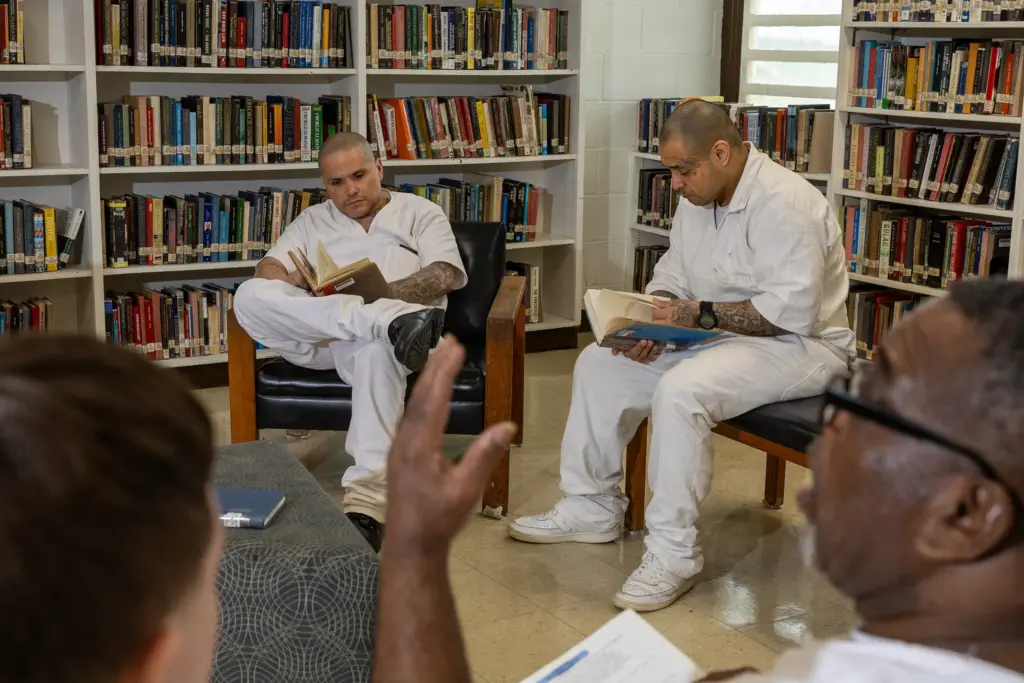 Inmates read books in the library of the TDCJ's Wynne Unit in Huntsville on May 21.