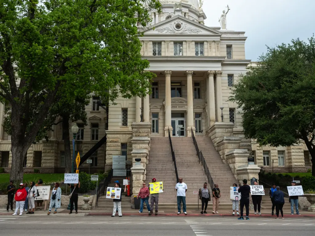 Around 20 people protest former Waco attorney Adam Hoffman’s sentencing on April 20, 2026. Hoffman was set to go to trial for first-degree felony continious sexual abuse of a young child and pleaded guilty to indecent assault and displaying harmful material to a minor. Hoffman will spend 30 days in jail and not be required to register as a sex offender.