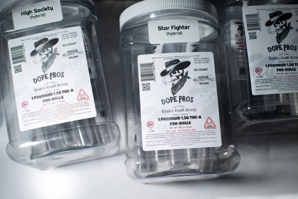 Individual packages of pre rolls in a display case at an Austin smoke shop on May 13, 2026.
