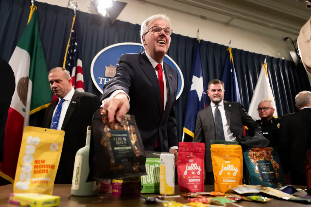 Lt. Gov. Dan Patrick shows off various THC and CBD products during a press conference in the Texas Capitol on May 28, 2025.