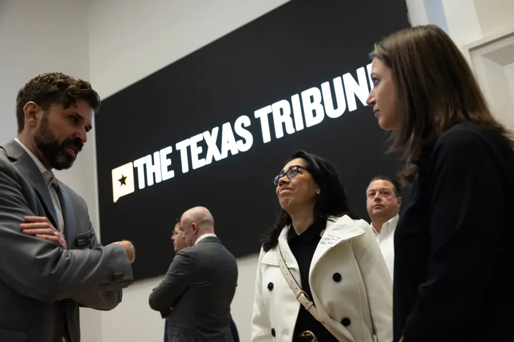 Texas Tribune senior events director Matt Ewalt chats with attendees following an event on the state’s community colleges Feb. 26, 2025 in Denton.