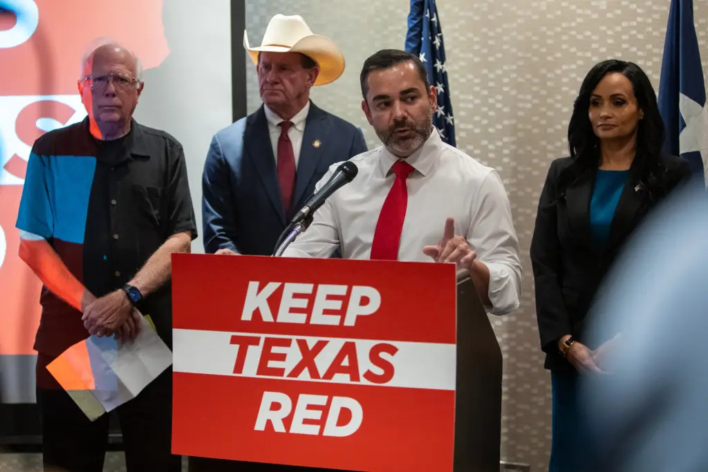 State Rep J. M. Lozano, R-Kingsville, speaks at a Keep Texas Red press conference in Corpus Christi during the Texas Democratic Convention on Thursday. Behind him, L-R: State Reps. Todd Hunter, R-Corpus Christi, A.J. Louderback, R-Victoria, and Katrina Pierson, R-Rockwall.