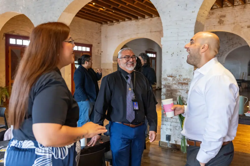 Texas Tribune Regions Editor Nic Garcia speaks with attendees at a Coffee and Conversation event in Brownsville on Sept. 25, 2025.