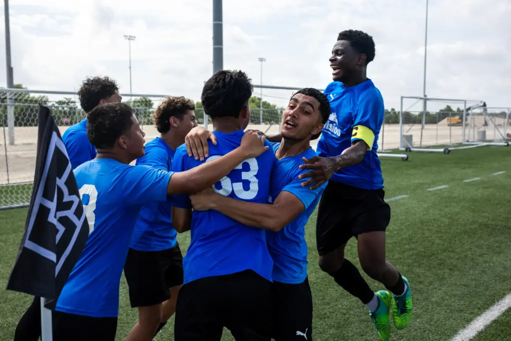 The reVison team celebrates their second goal in the first half during the regional final of the US Youth Soccer Presidents Cup, Sunday, June 14, 2026, in Round Rock. (Antranik Tavitian for The Texas Tribune)