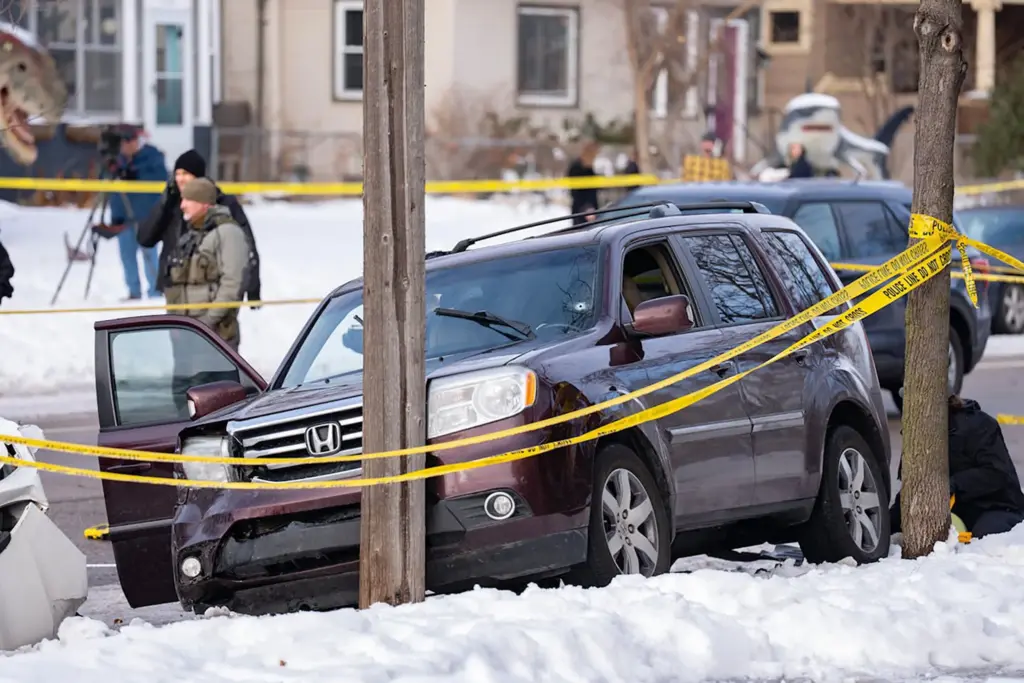 A bullet hole is visible in the windshield of the SUV that Renee Good was driving when she was fatally shot by ICE agent Jonathan Ross in Minneapolis on Jan. 7, 2026.