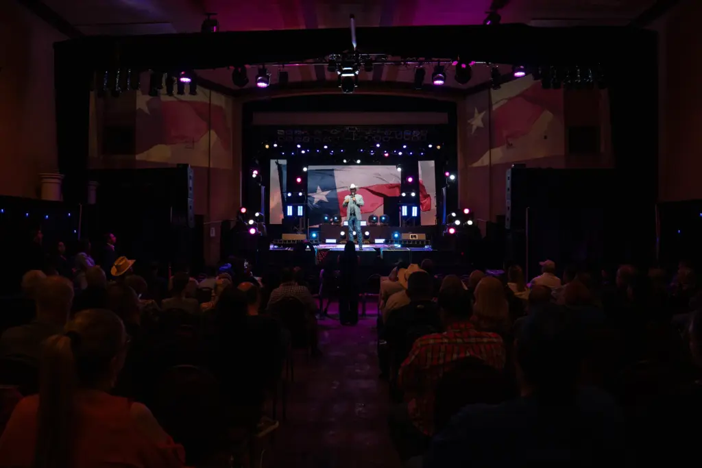 Bobby Pulido, Latin Grammy winner and now the democratic congressional nominee for District 15, speaks during a Texas Together Rally at Cine El Rey in McAllen, Texas on March 9, 2026. Gabriel V. Cárdenas for The Texas Tribune