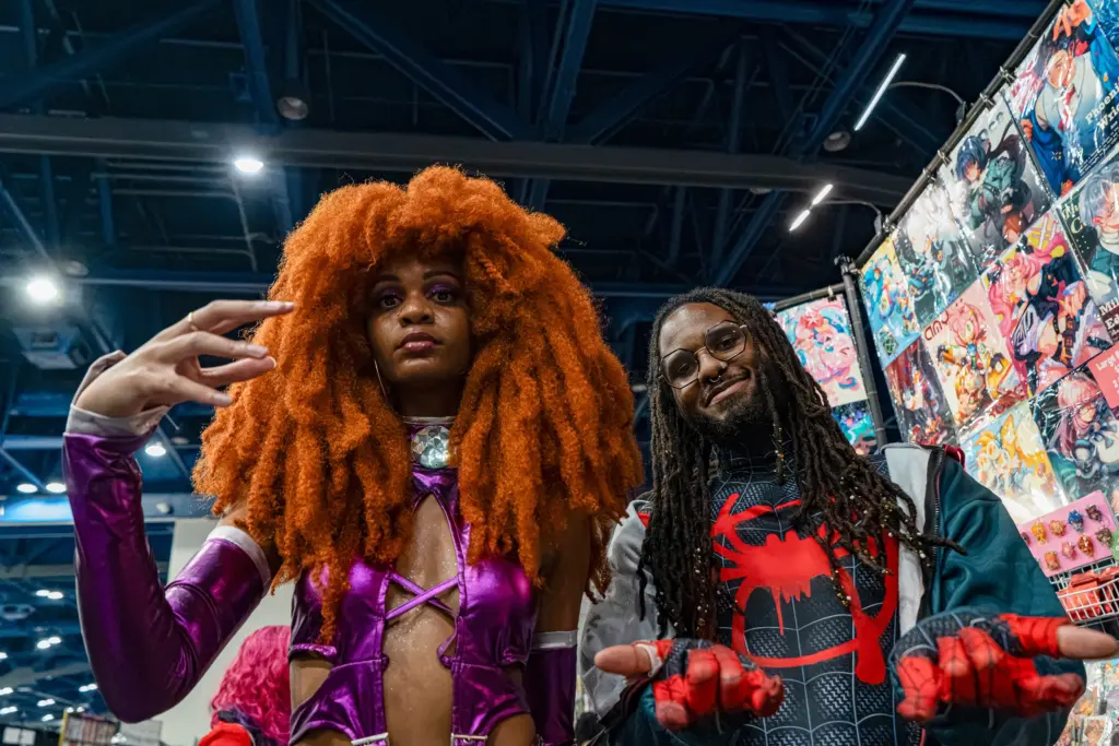 Kiki (L) and Josh (R) of Atlanta pose for a portrait at Dream Con 2026 in Houston. Of the three day event Josh said “ I’m a big fan of it being geared towards people of color, I feel celebrated” . Saturday, July 11, 2026, in Houston. (Douglas Sweet Jr / The Texas Tribune)