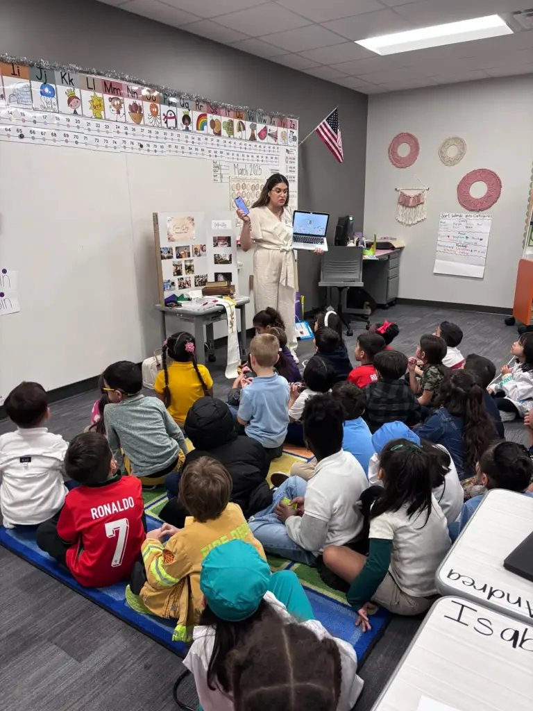 The Rev. Rosedanny Ortiz speaks to an elementary school class about her job in ministry.