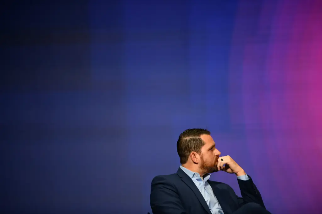 John Seago listens while on a panel during the Texas Youth Summit in The Woodlands on Sept. 20, 2025.