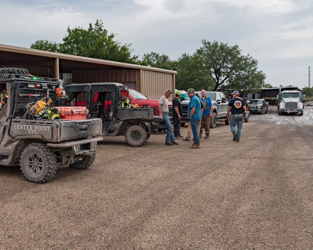 Volunteers gather outside the Center Point Volunteer Fire Department station on July 17, 2026.