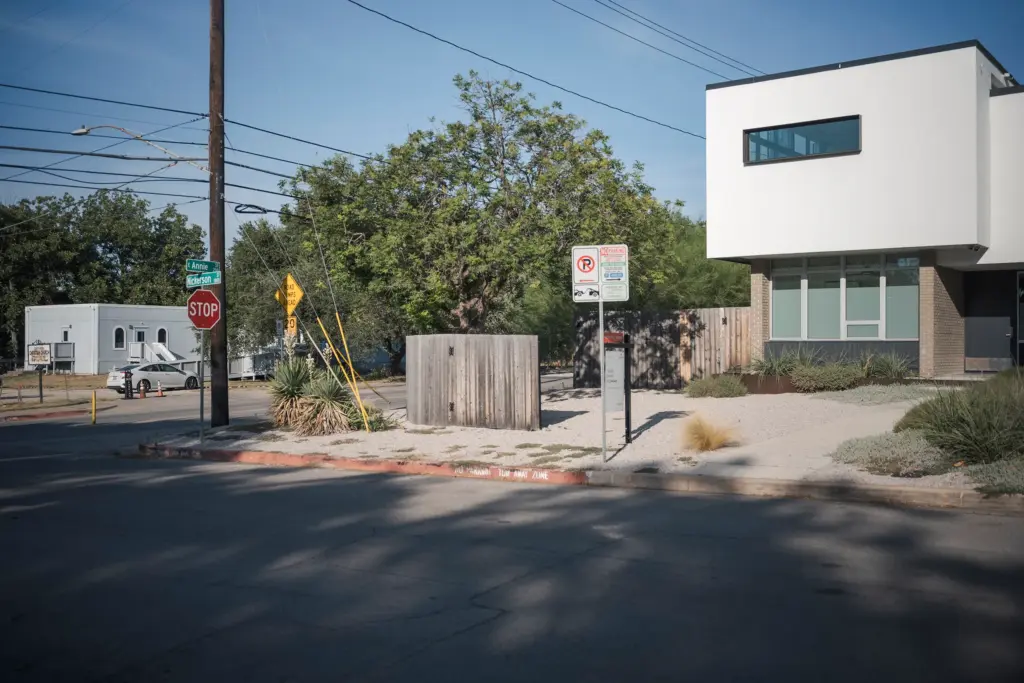 The South Austin Christian Church, left, seen on Tuesday, Aug. 24, 2026, along South Congress within the Travis Heights neighborhood. The church has faced pushback from its neighbors in the form of a ‘valid petition’ after plans to sell its property to an affordable housing developer were announced. The Austin City Council approved the project unanimously and the property will be developed into homes for up to 65 people.