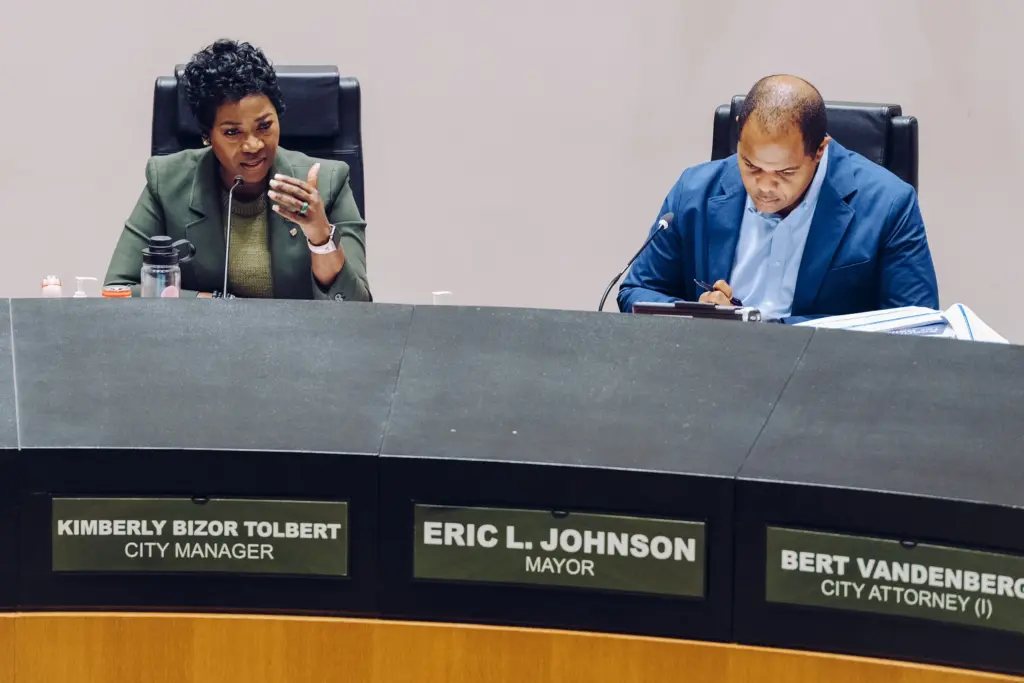 City Manager Kimberly Bizor Tolbert and Mayor Eric Johnson at Dallas City Hall during a City Council meeting to discuss budget changes on Tuesday, Aug. 11, 2026.