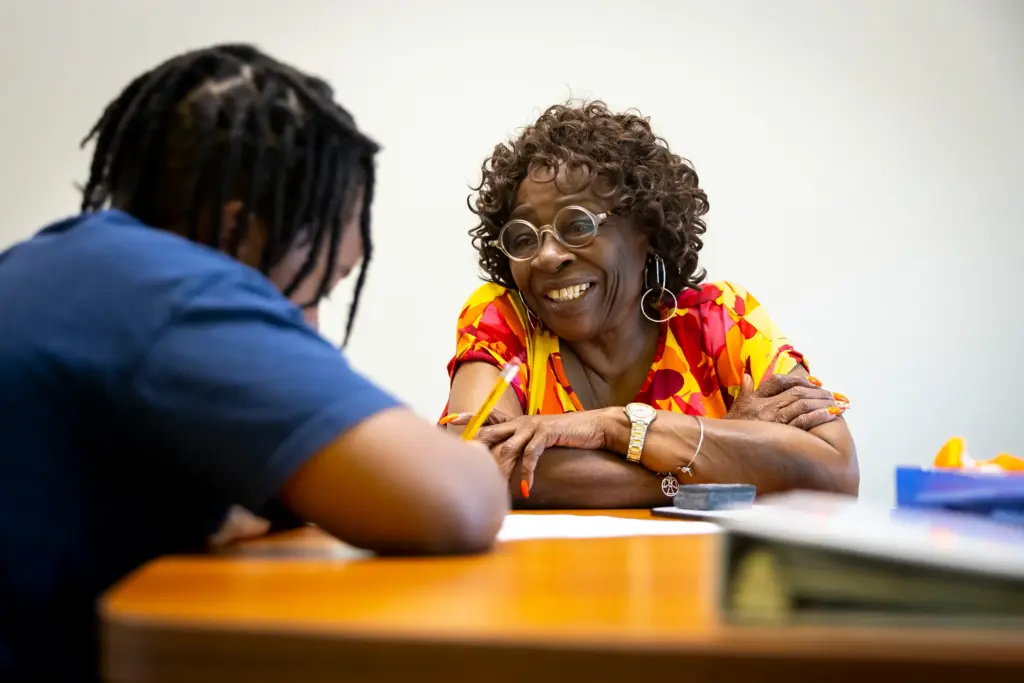 Retired educator Arleen Woodson tutors incoming sixth grader Jaleel Montgomery, 11, at the Missouri City Branch Library on Thursday, Aug. 6, 2026, in Missouri City.