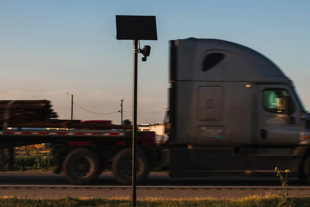 A Flock automatic license plate reader (ALPR) operated by Texas Department of Public Safety (DPS) records vehicles that drive past on State Highway 6 in Speegleville, Texas on Tuesday, July 28, 2026.