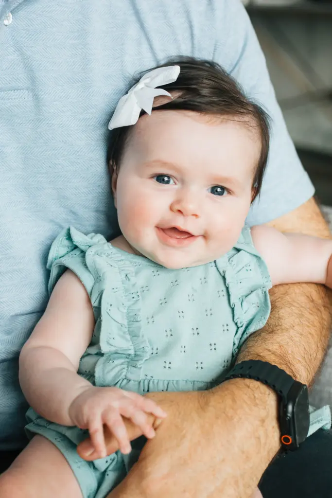 Eliana Stone is held by father Kevin Stone in their home on Aug. 26, 2026.